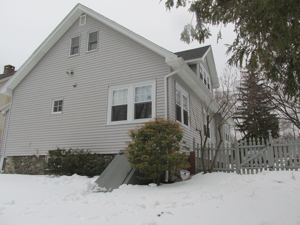 9 Pomona Road Worcester, MA 01602 - Photo 4 of 29 a view of a house with a yard