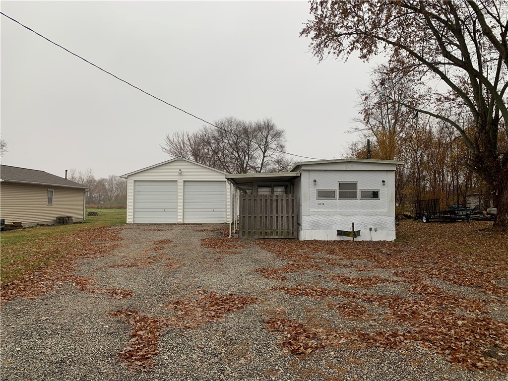 5715 Ocean Trail Decatur, IL 62521 - Photo 2 of 23 a view of a house with a yard