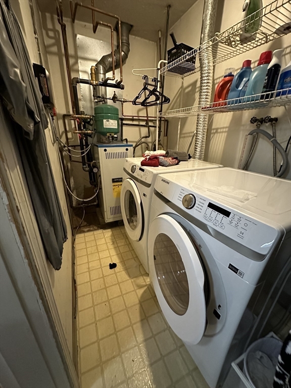 20 Knox Street, Unit 24 Lawrence, MA 01841 - Photo 11 of 13 a utility room with dryer and washer