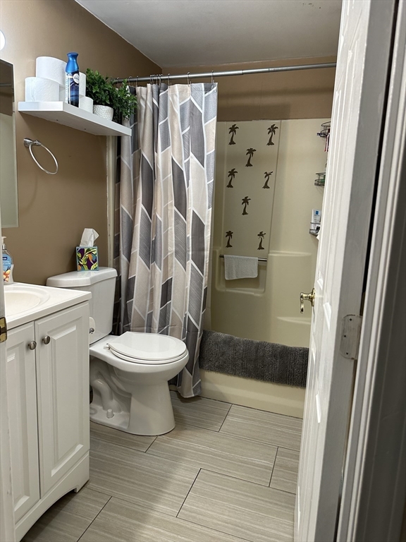 20 Knox Street, Unit 24 Lawrence, MA 01841 - Photo 10 of 13 a bathroom with a toilet and a shower