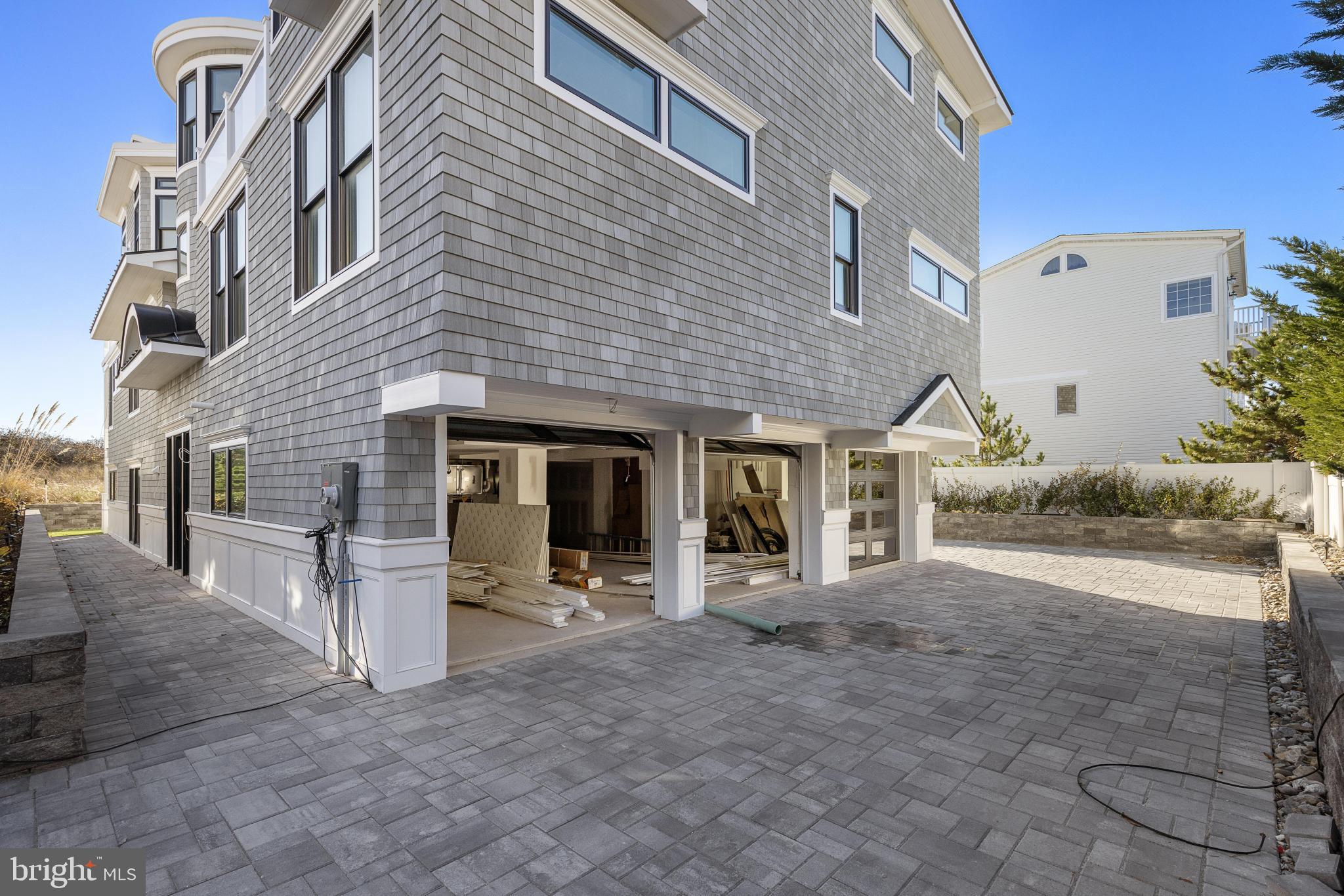 11 East 30th Street Barnegat Light, NJ 08006 - Photo 7 of 28 a view of a house with a patio