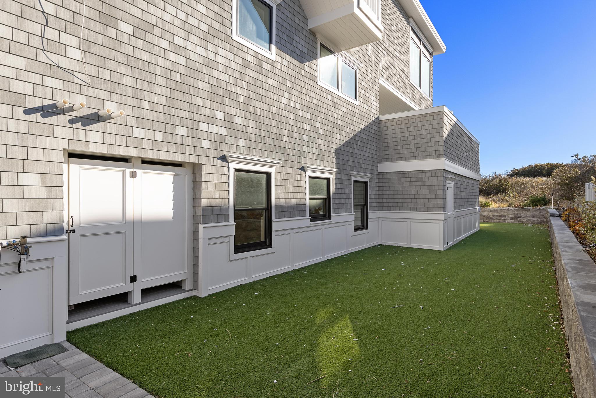 11 East 30th Street Barnegat Light, NJ 08006 - Photo 8 of 28 a view of a house with a yard