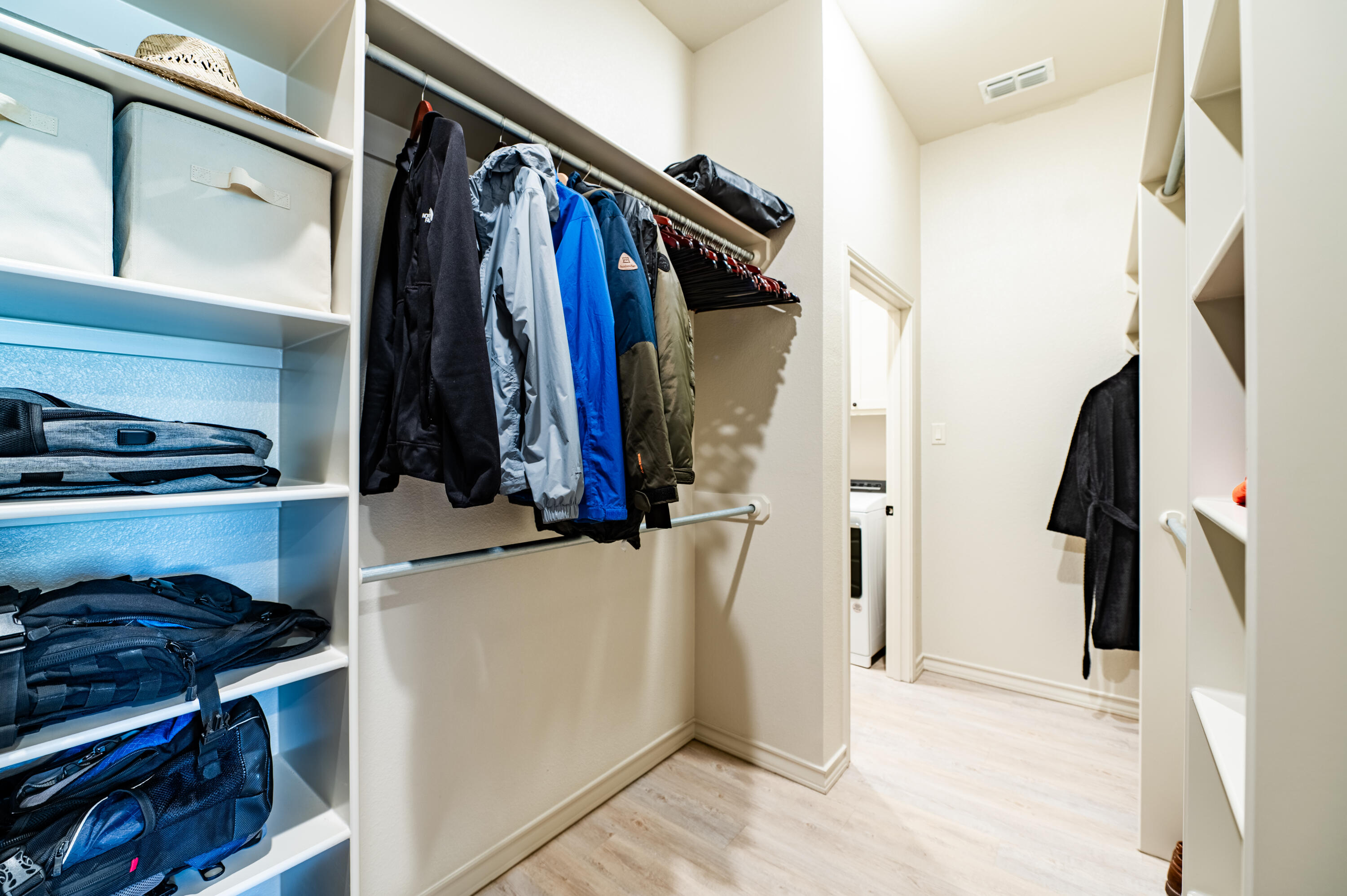 3442 126th Street Lubbock, TX 79423 - Photo 19 of 53 a view of walk in closet with clothes and shoes
