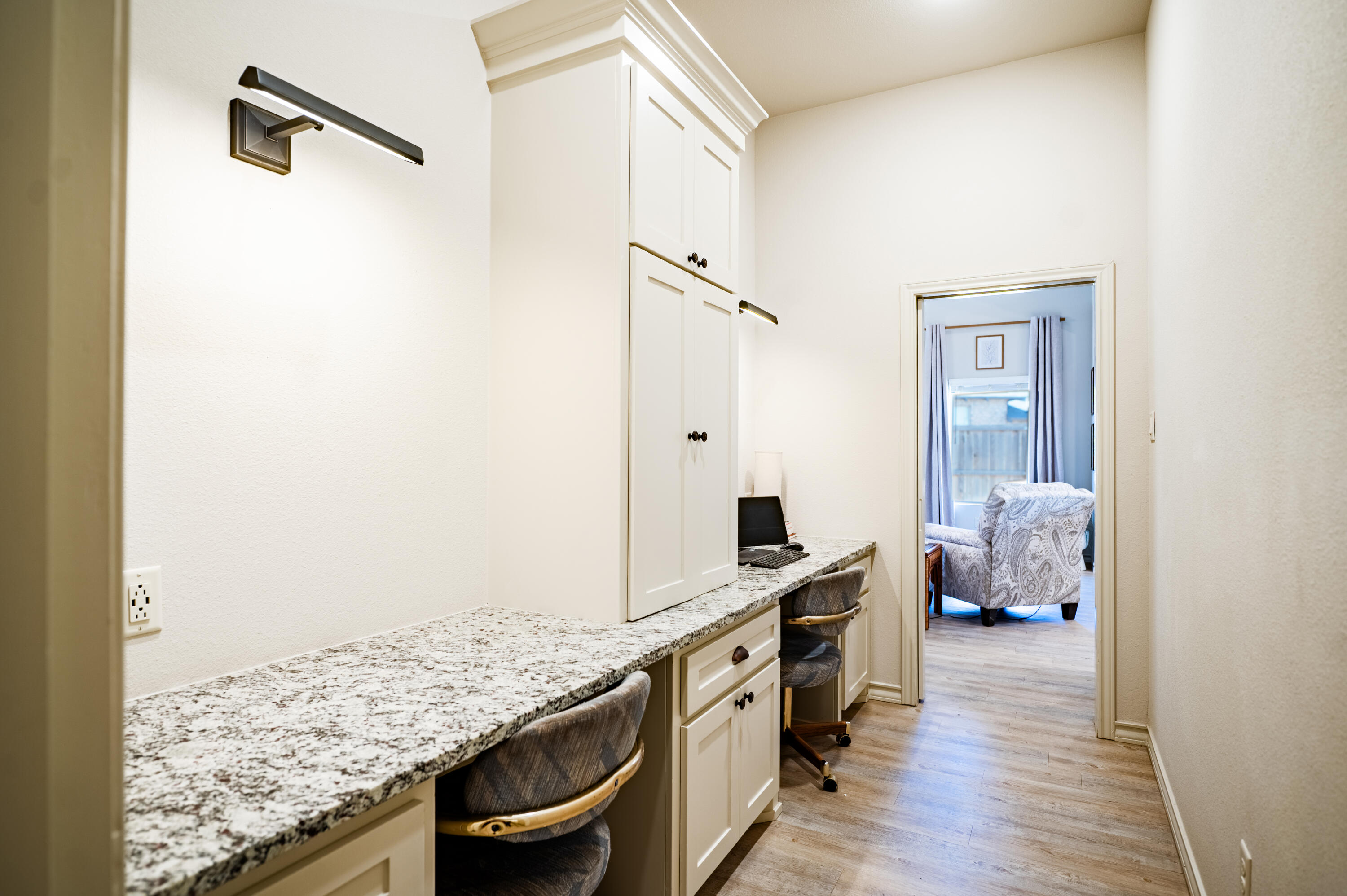 3442 126th Street Lubbock, TX 79423 - Photo 22 of 53 a view of a kitchen counter space and wooden floor