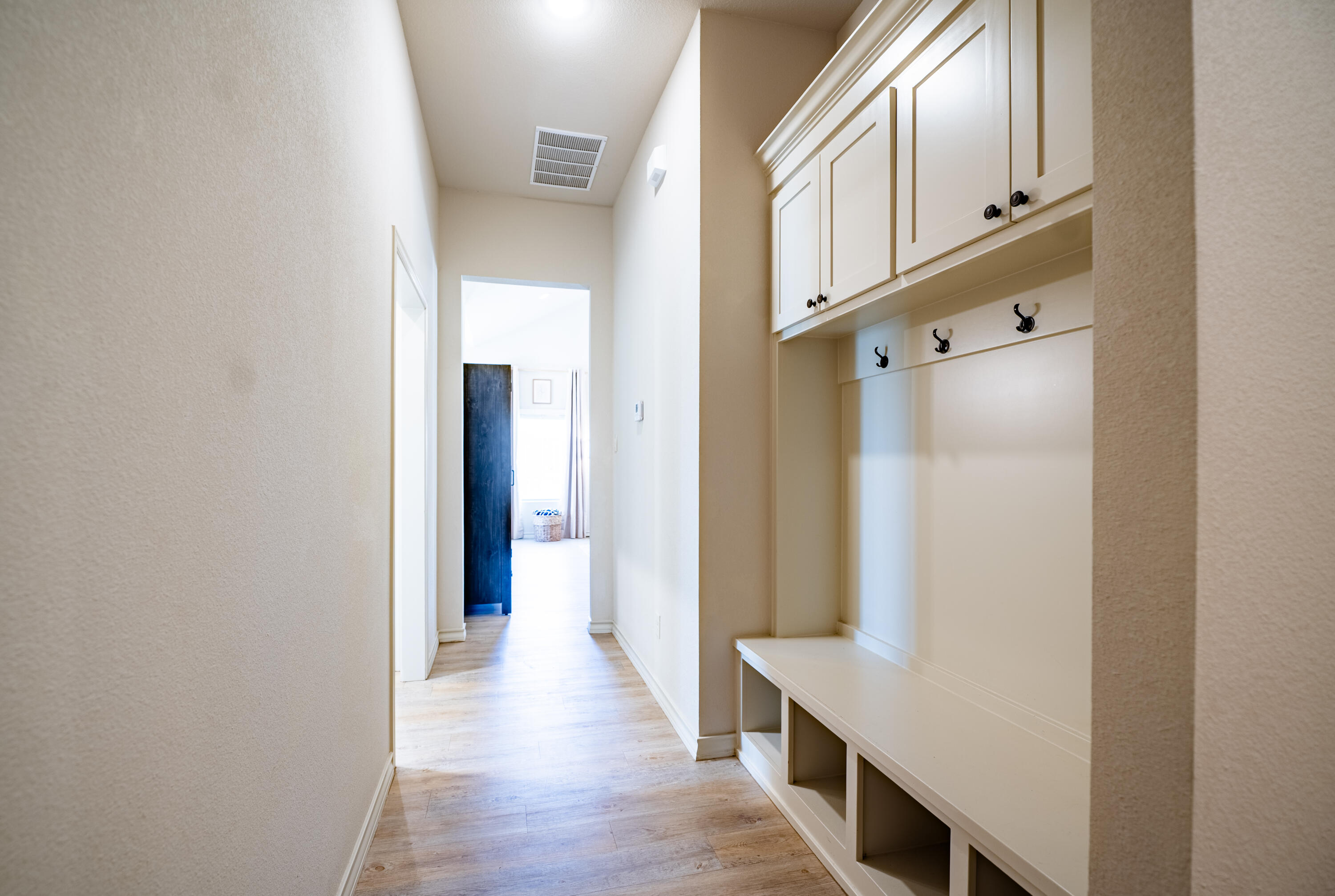 3442 126th Street Lubbock, TX 79423 - Photo 28 of 53 a view of a hallway with wooden floor