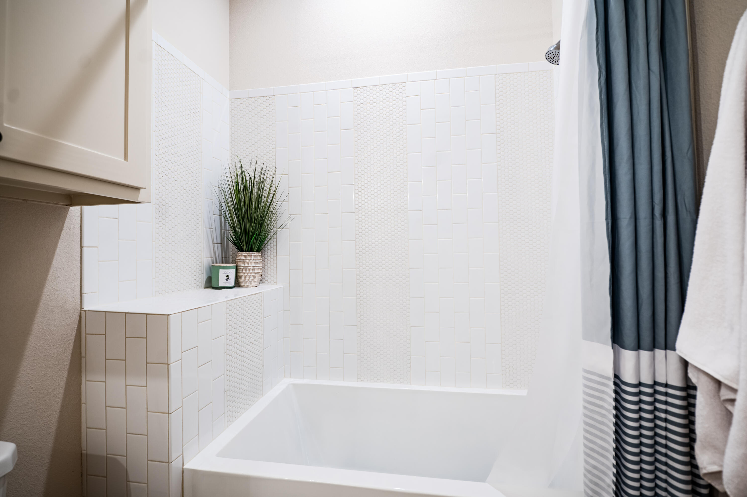 3442 126th Street Lubbock, TX 79423 - Photo 30 of 53 a bathroom with a bathtub