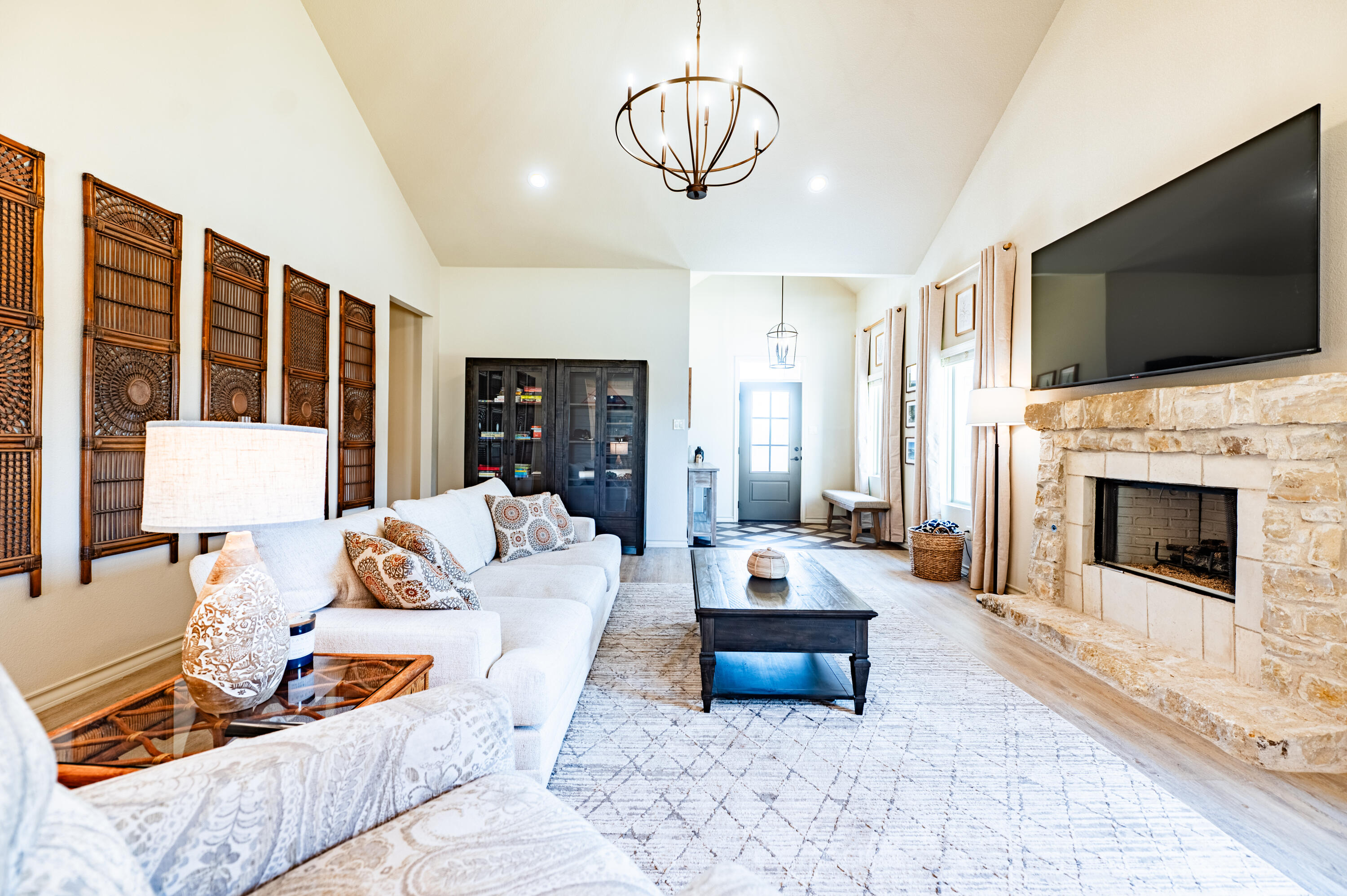 3442 126th Street Lubbock, TX 79423 - Photo 35 of 53 a living room with furniture fireplace and flat screen tv