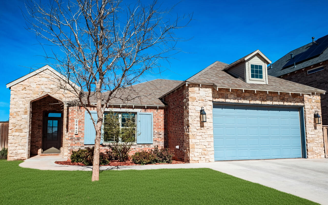 3442 126th Street Lubbock, TX 79423 - Photo 4 of 53 a front view of a house with a yard