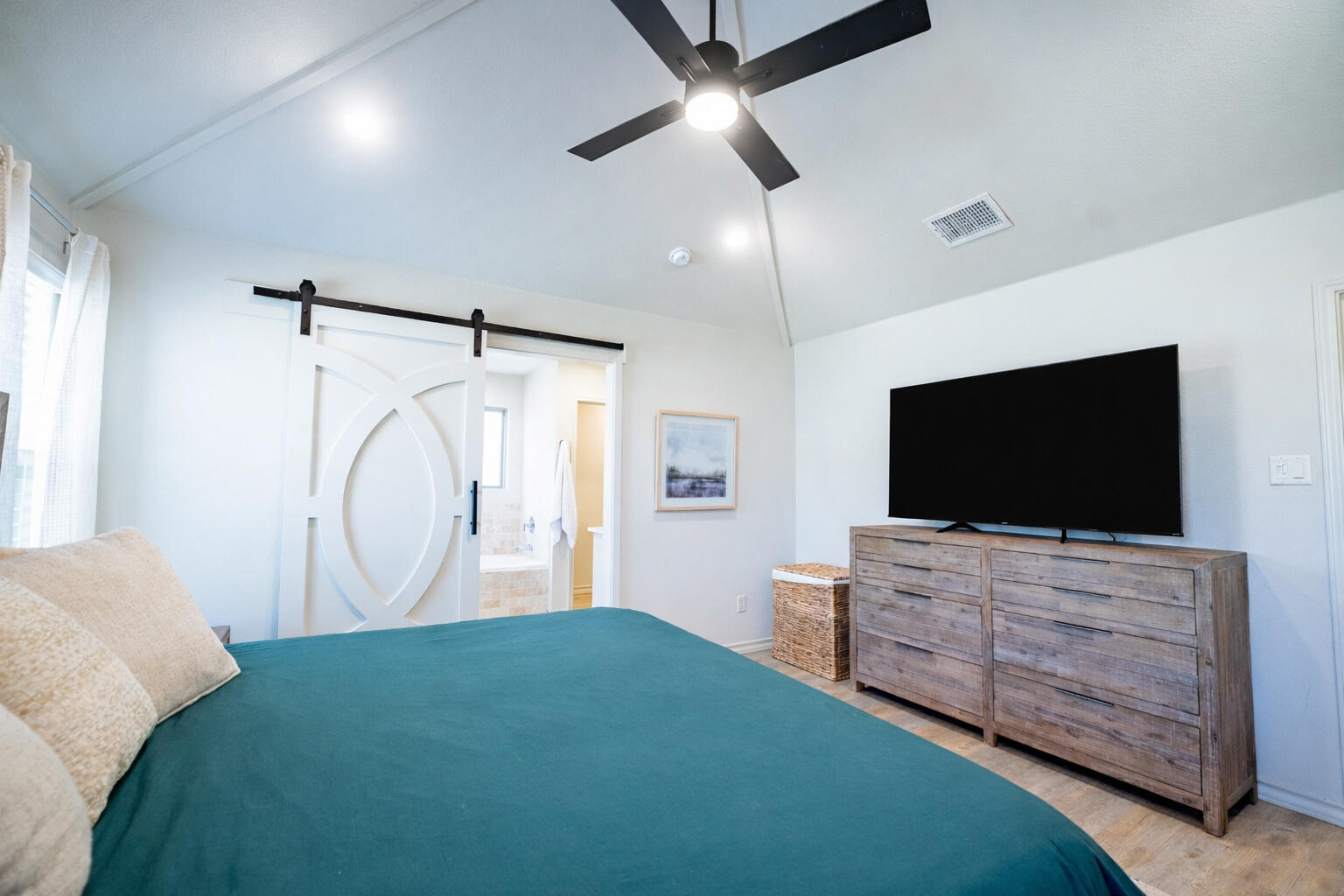 3442 126th Street Lubbock, TX 79423 - Photo 41 of 53 a living room with furniture and a flat screen tv