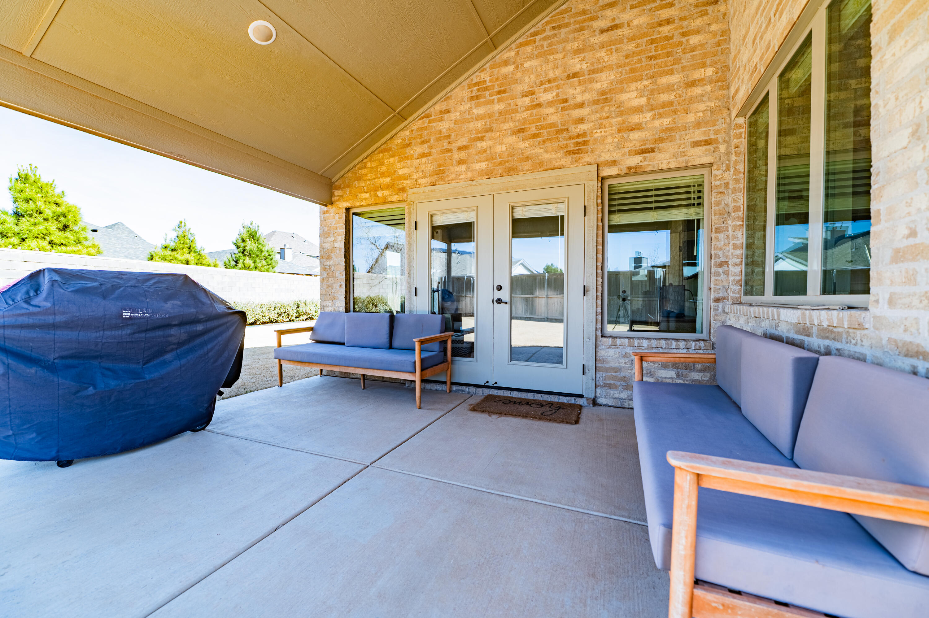 3442 126th Street Lubbock, TX 79423 - Photo 48 of 53 a living room with furniture and a potted plant