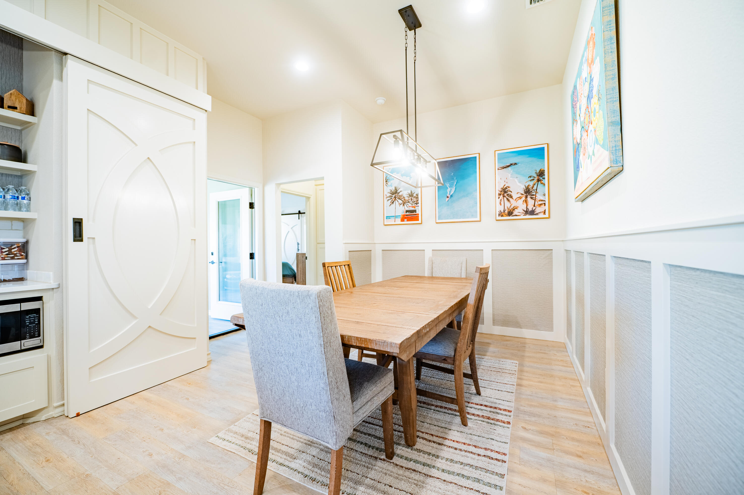3442 126th Street Lubbock, TX 79423 - Photo 10 of 53 a view of a dining room with furniture and wooden floor