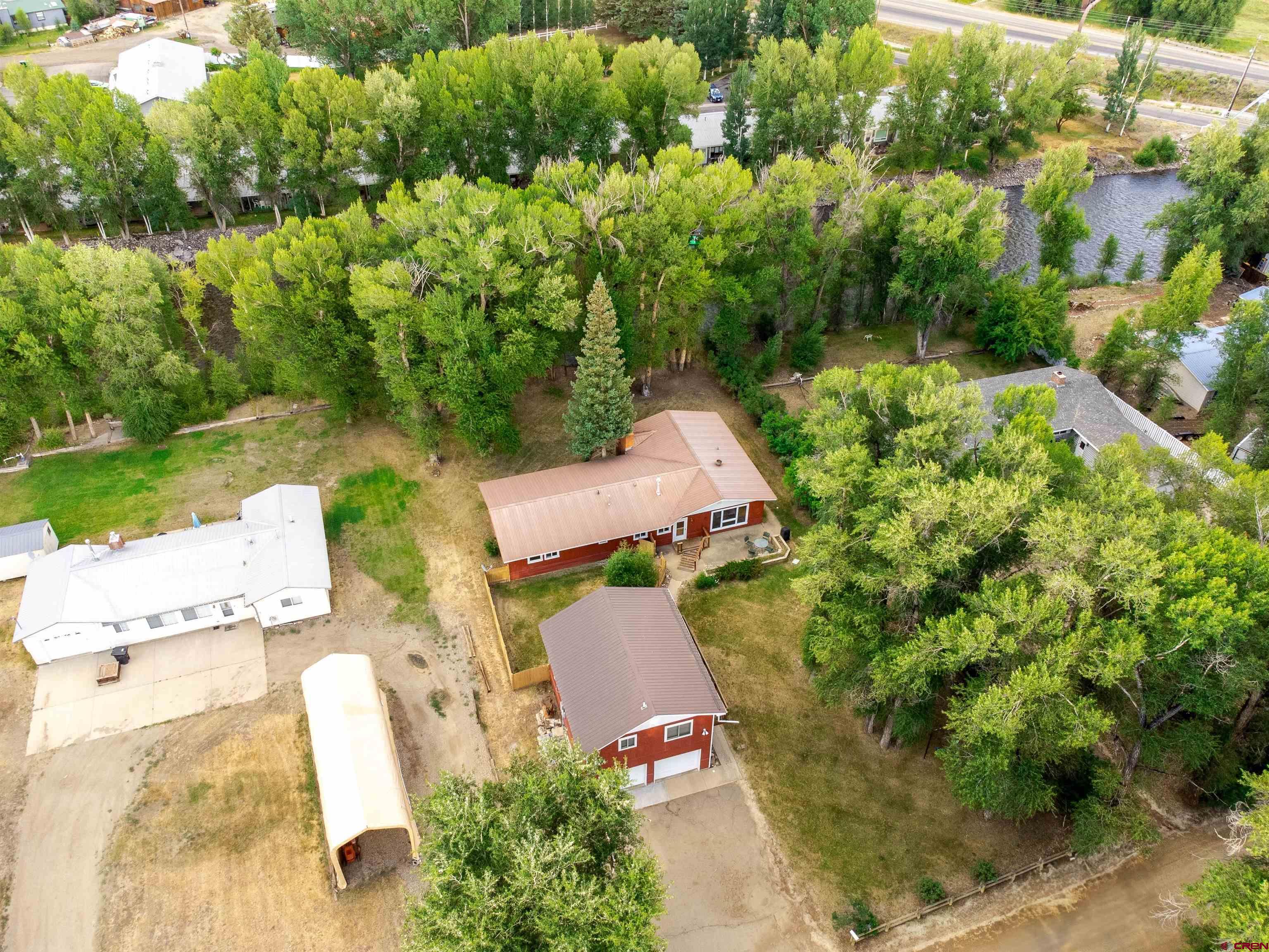 128 Bevington Road Gunnison, CO 81230 - Photo 36 of 37 an aerial view of a house with a yard basket ball court and outdoor seating
