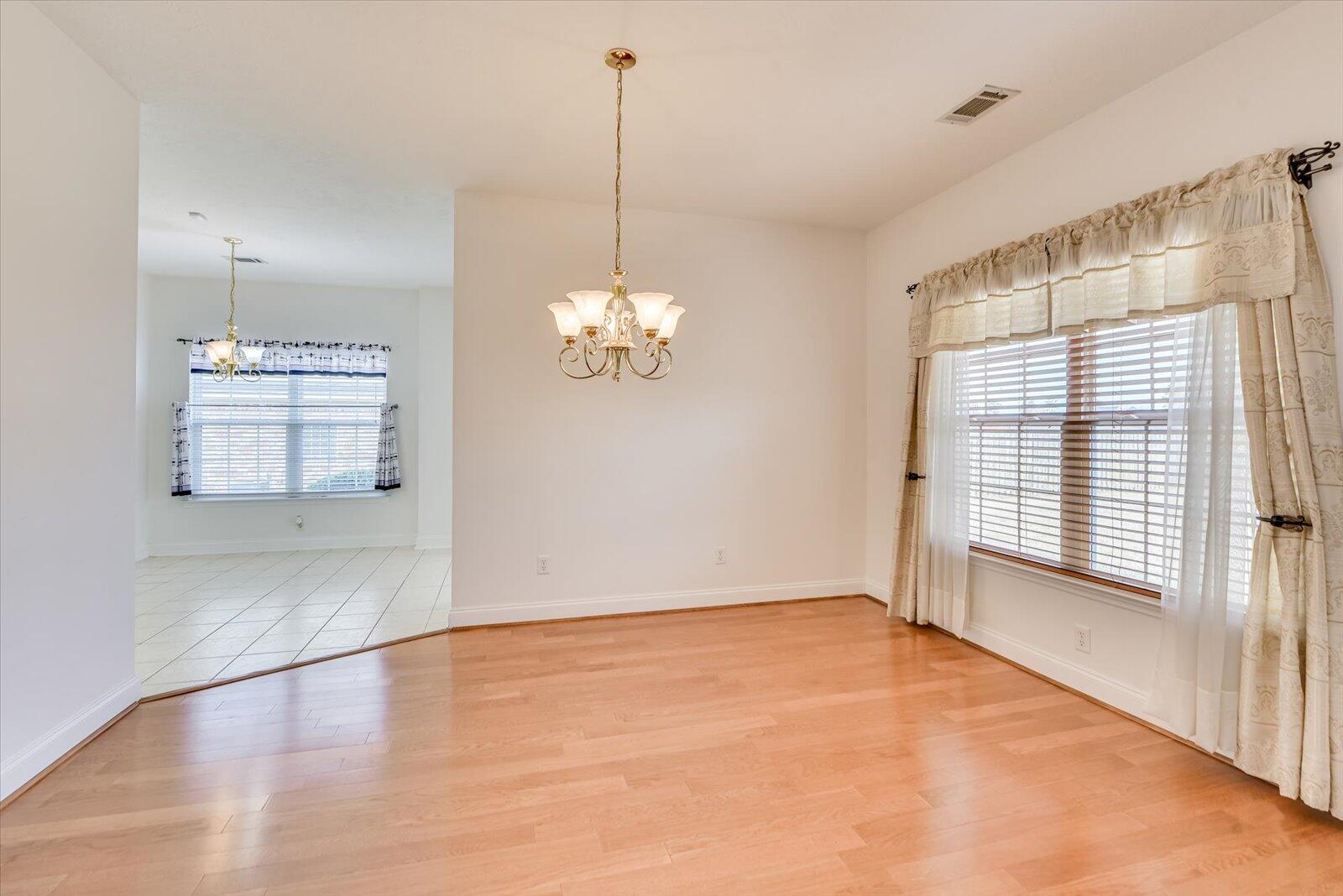 4598 Logans Way Augusta, GA 30909 - Photo 12 of 38 This formal dining room has lots of natural light and comes with wood faux blinds