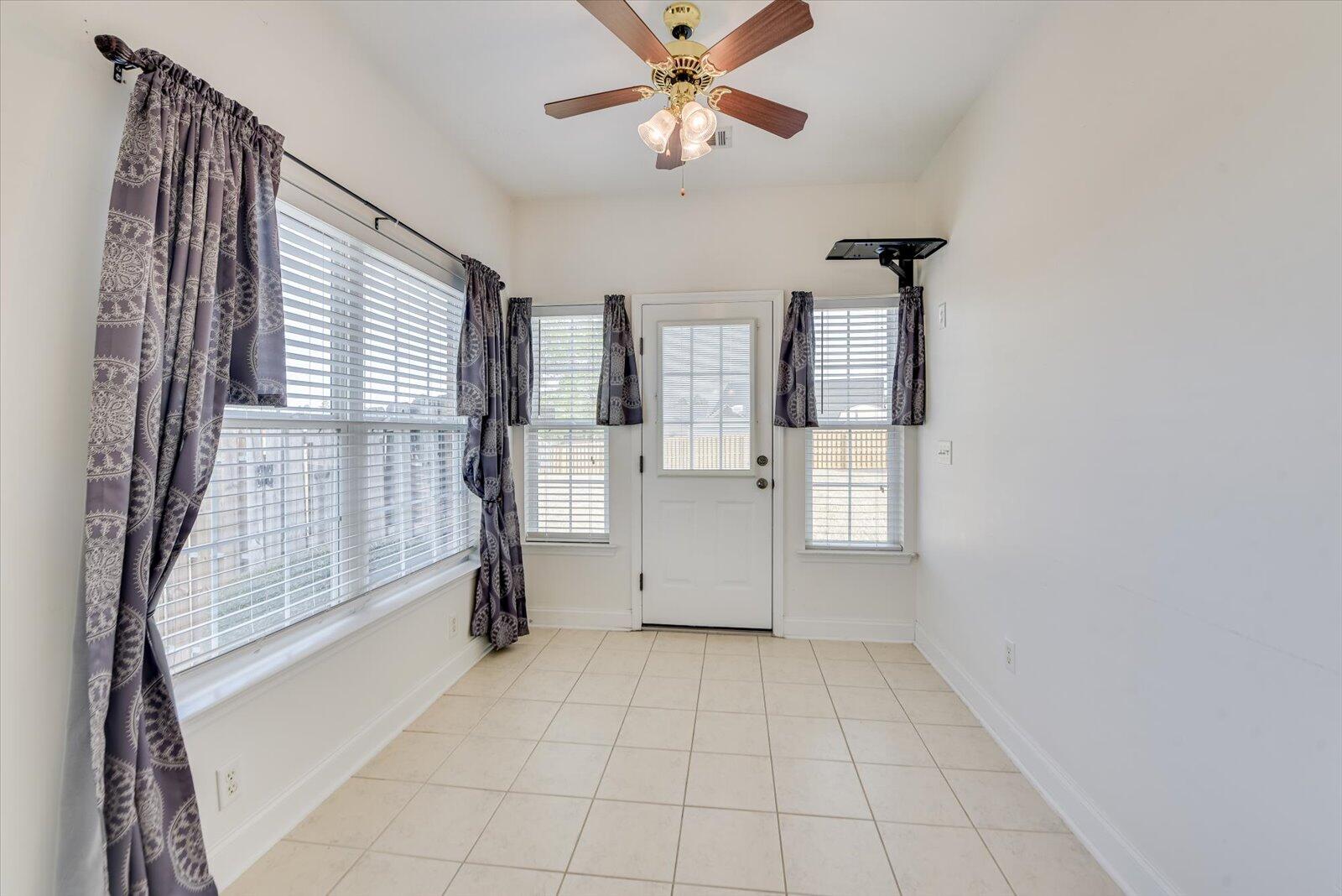 4598 Logans Way Augusta, GA 30909 - Photo 18 of 38 Sunroom with TV mount in top corner. The things you could do with this space