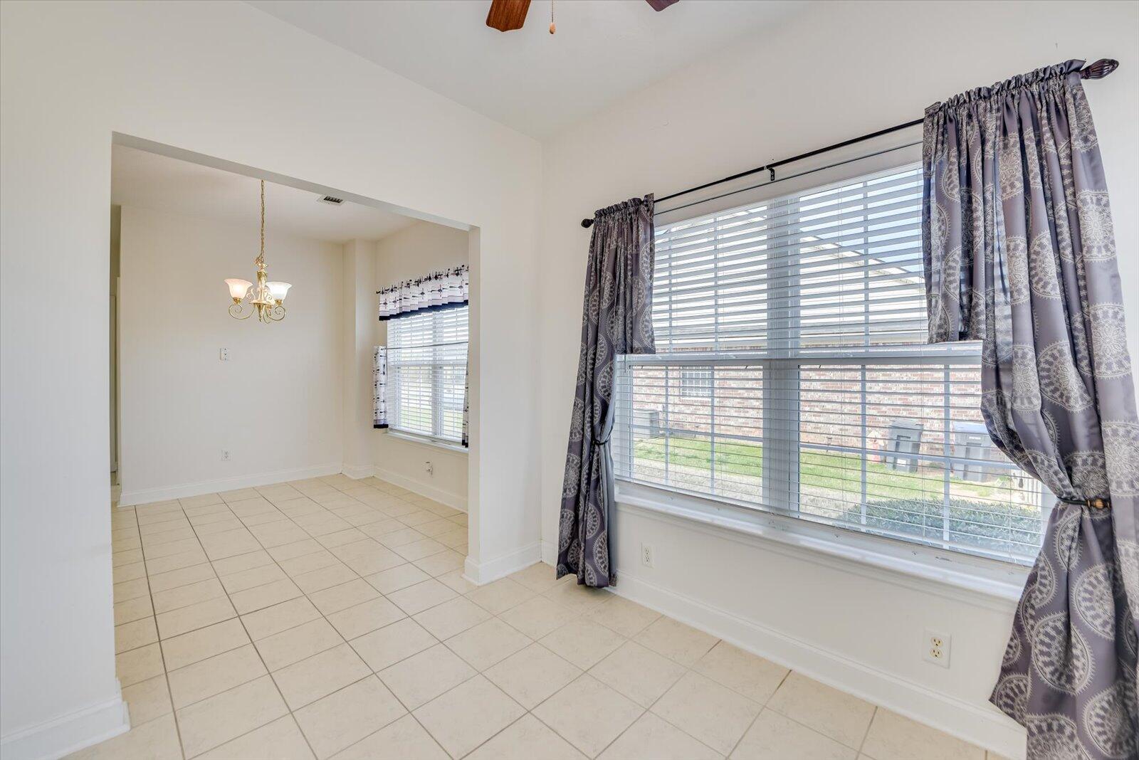 4598 Logans Way Augusta, GA 30909 - Photo 19 of 38 Sunroom with tons of natural light and wood faux blinds