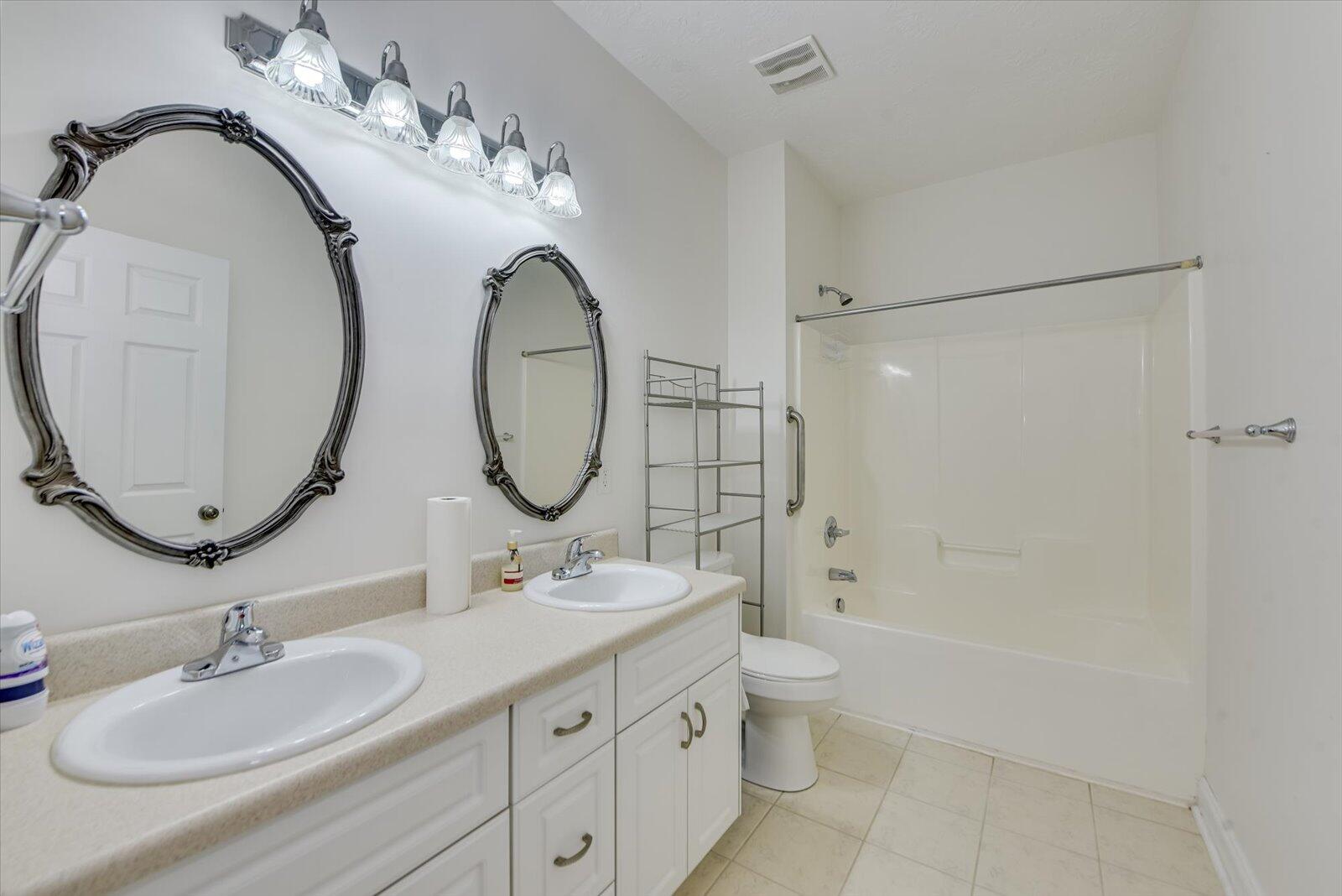4598 Logans Way Augusta, GA 30909 - Photo 26 of 38 Guest bath with double sinks and neutrals colors