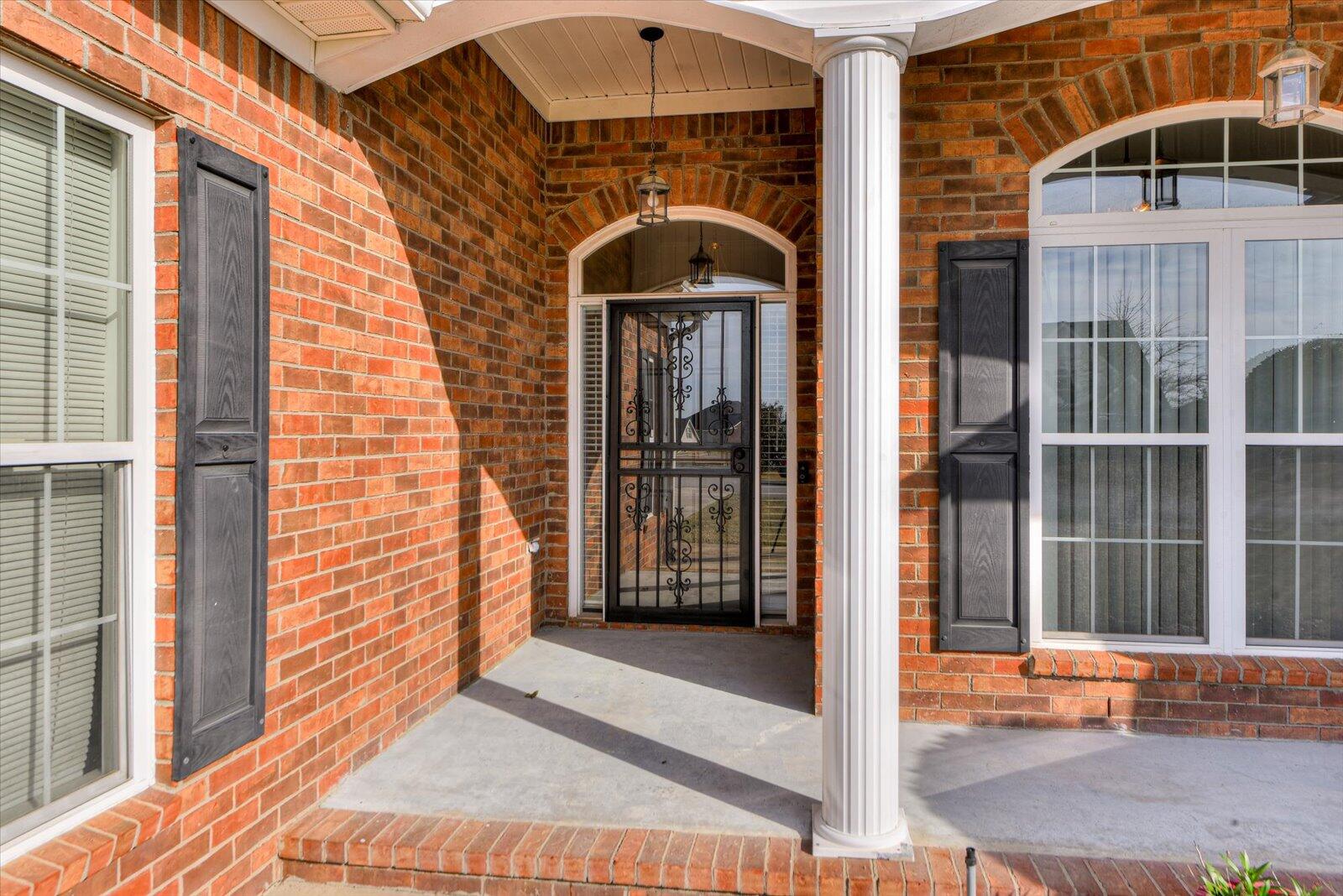 4598 Logans Way Augusta, GA 30909 - Photo 3 of 38 Front porch with beautiful metal storm door