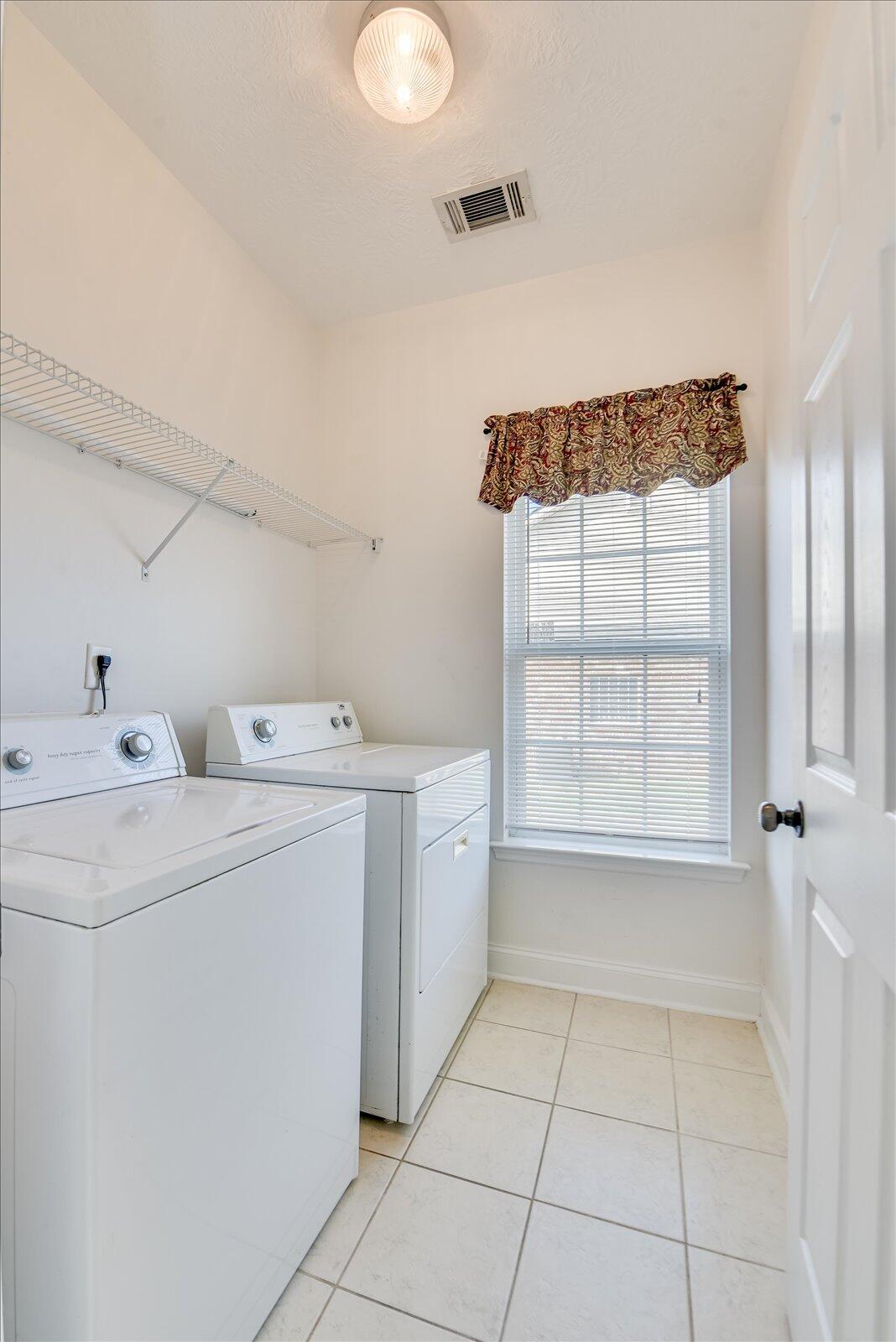 4598 Logans Way Augusta, GA 30909 - Photo 31 of 38 Launty room with alarm panel. Washer and Dryer will remain.