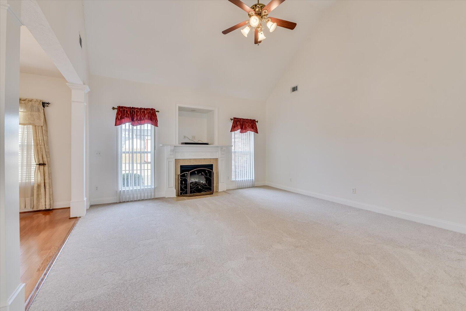 4598 Logans Way Augusta, GA 30909 - Photo 7 of 38 Great room with electric fireplace and extendable TV mount above it