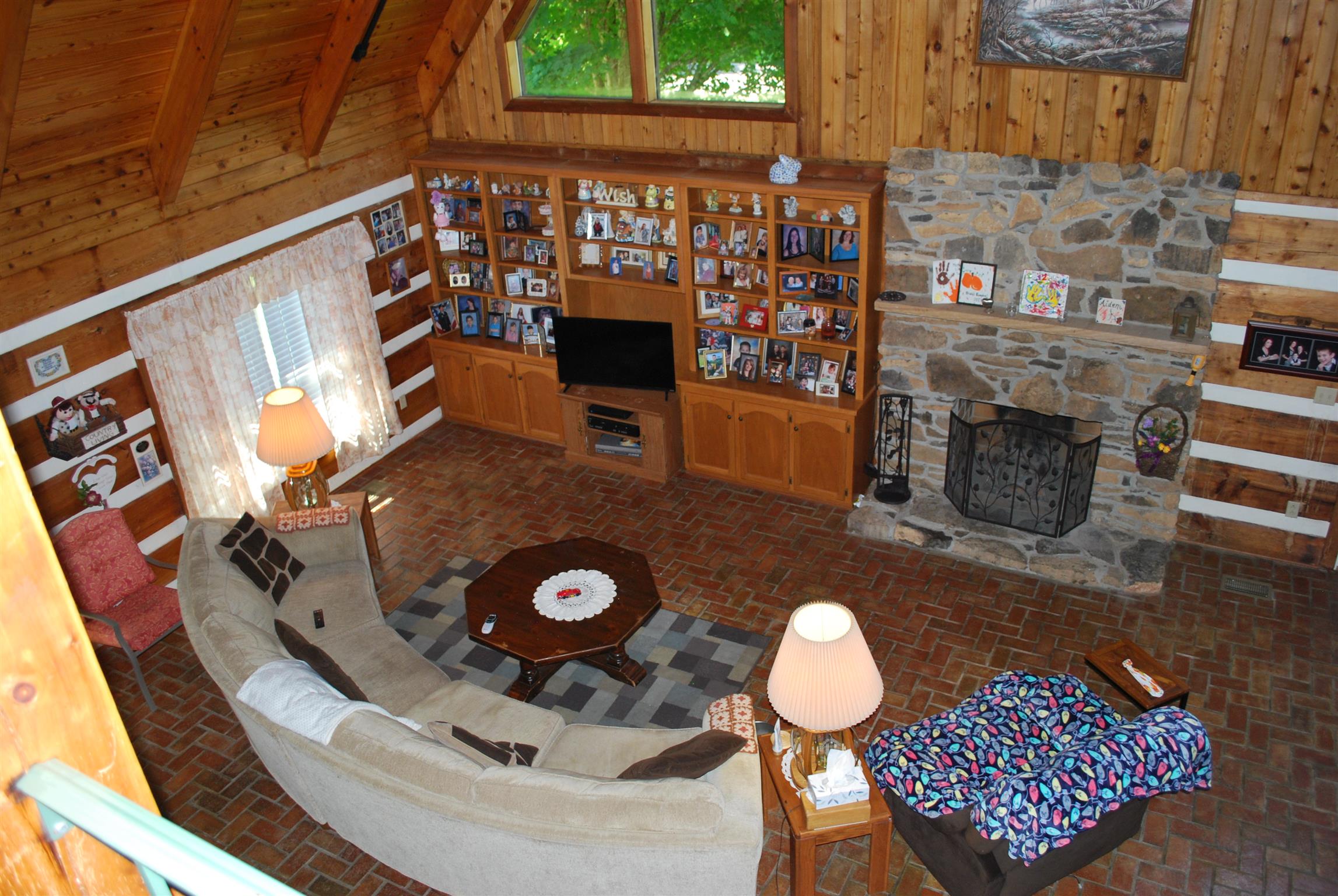5729 Keysburg Road Adams, TN 37010 - Photo 11 of 30 a living room with furniture and a fireplace
