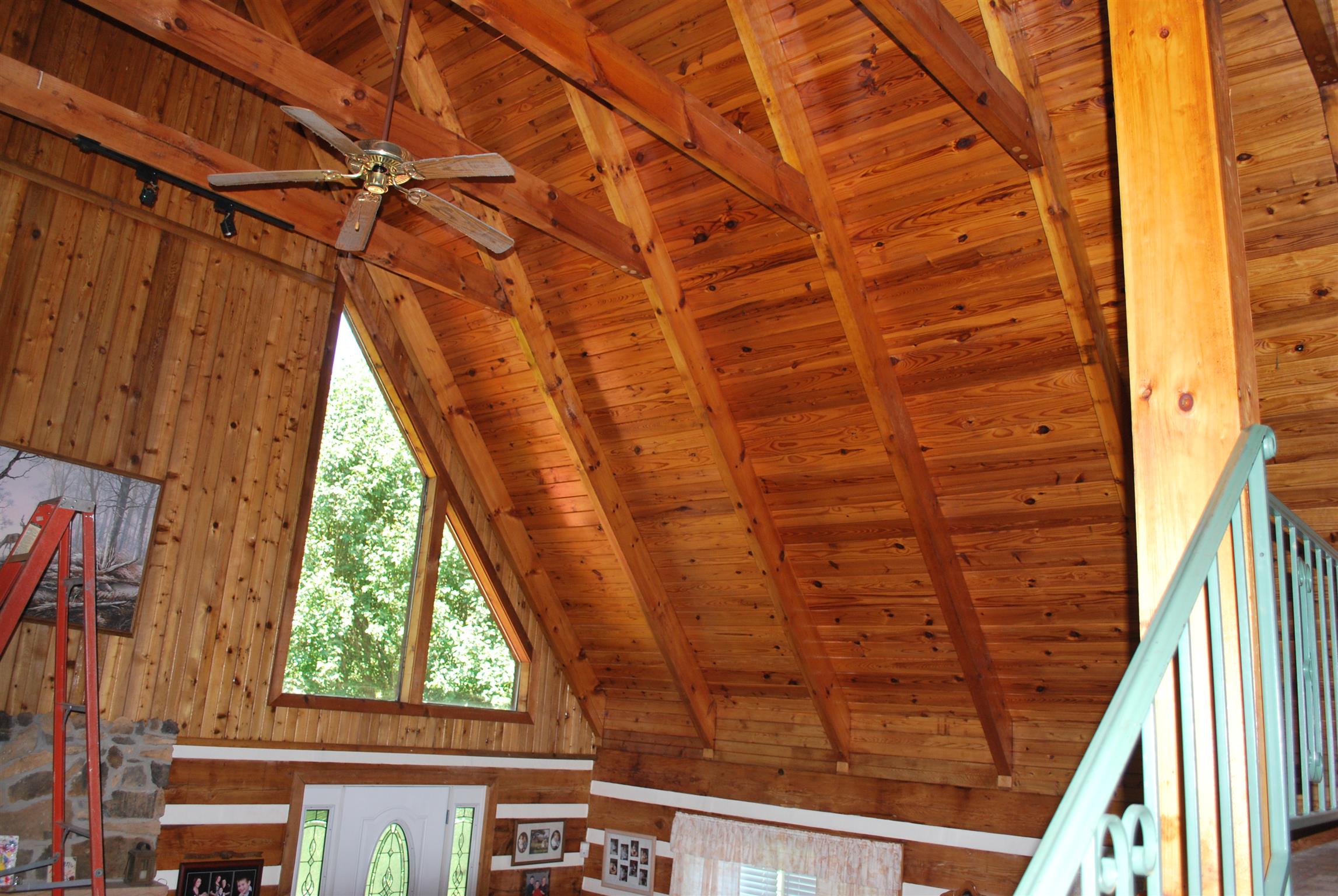 5729 Keysburg Road Adams, TN 37010 - Photo 13 of 30 a view of a balcony with wooden floor and door
