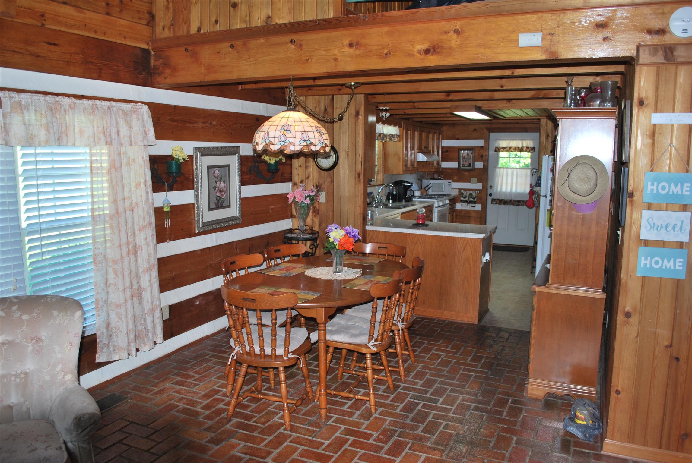 5729 Keysburg Road Adams, TN 37010 - Photo 21 of 30 a dining room with furniture and window