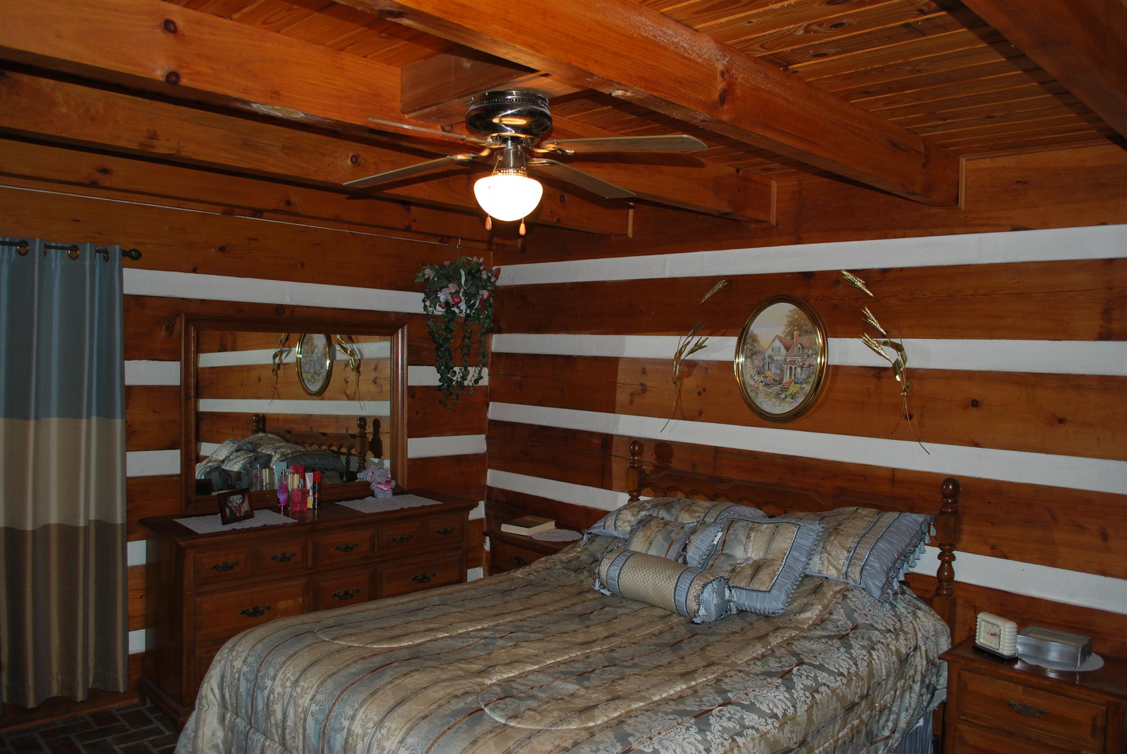 5729 Keysburg Road Adams, TN 37010 - Photo 23 of 30 a bedroom with a bed and a window