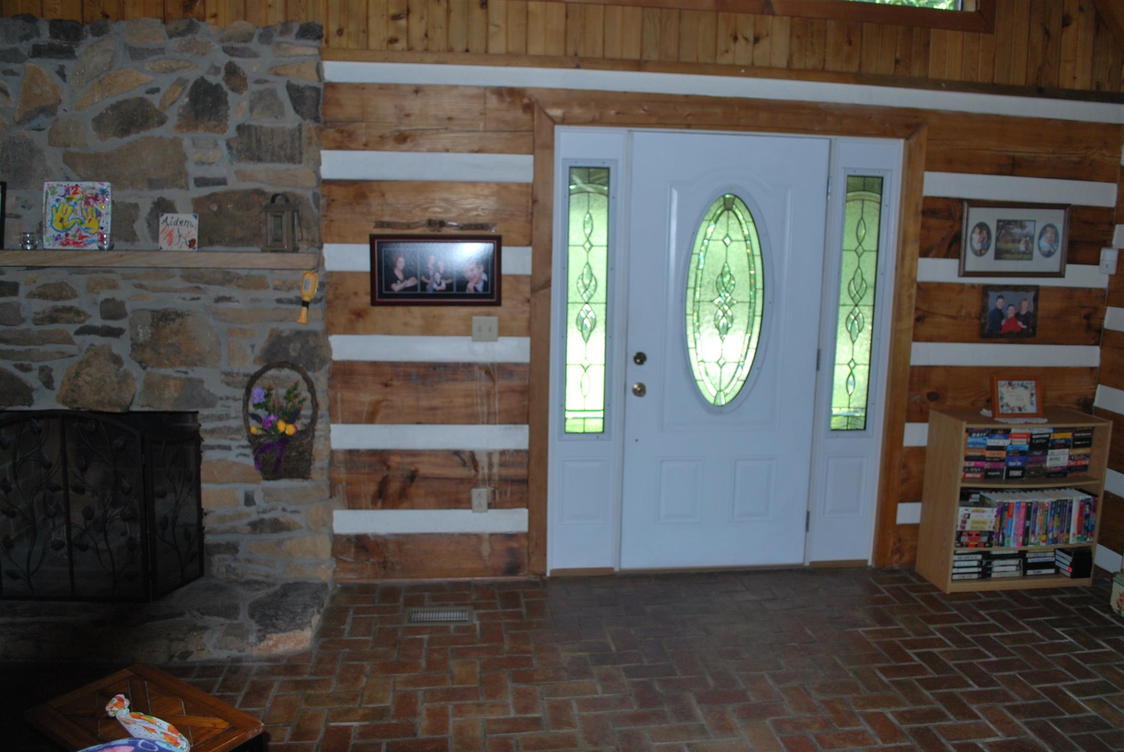 5729 Keysburg Road Adams, TN 37010 - Photo 9 of 30 a living room with fireplace