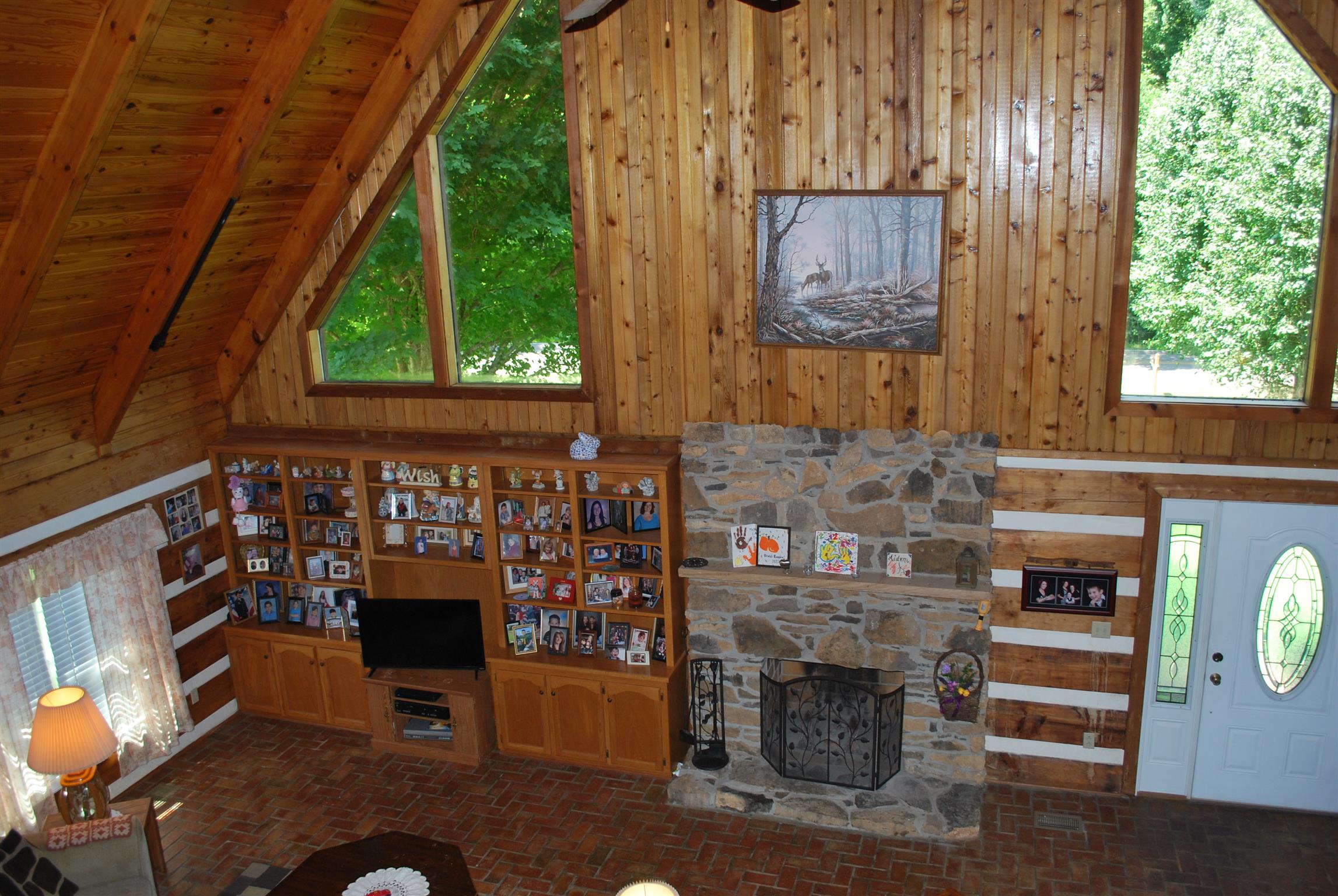 5729 Keysburg Road Adams, TN 37010 - Photo 10 of 30 a living room with furniture and a fireplace