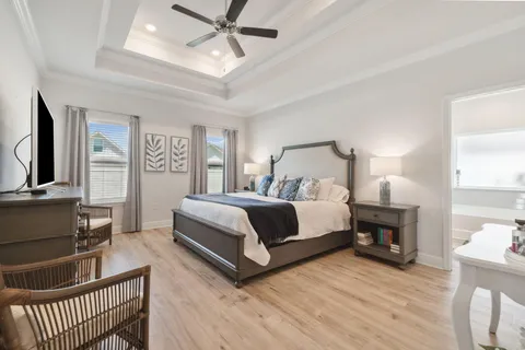a bathroom with a tub sink and a mirror