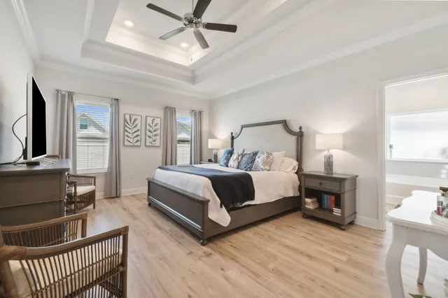 a bathroom with a tub sink and a mirror