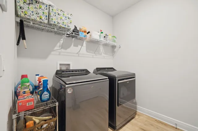 a bathroom with a sink toilet tub and shower