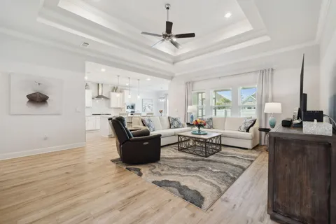 a kitchen with stainless steel appliances granite countertop a sink and a stove
