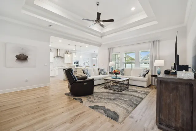 a kitchen with stainless steel appliances granite countertop a sink and a stove