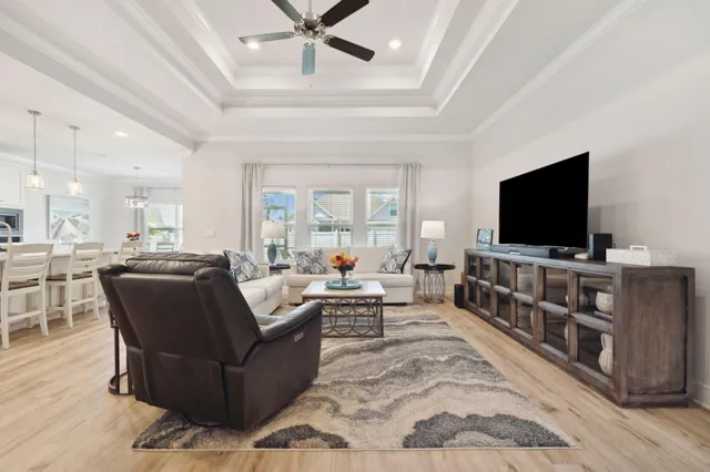 a kitchen with white cabinets and a stove