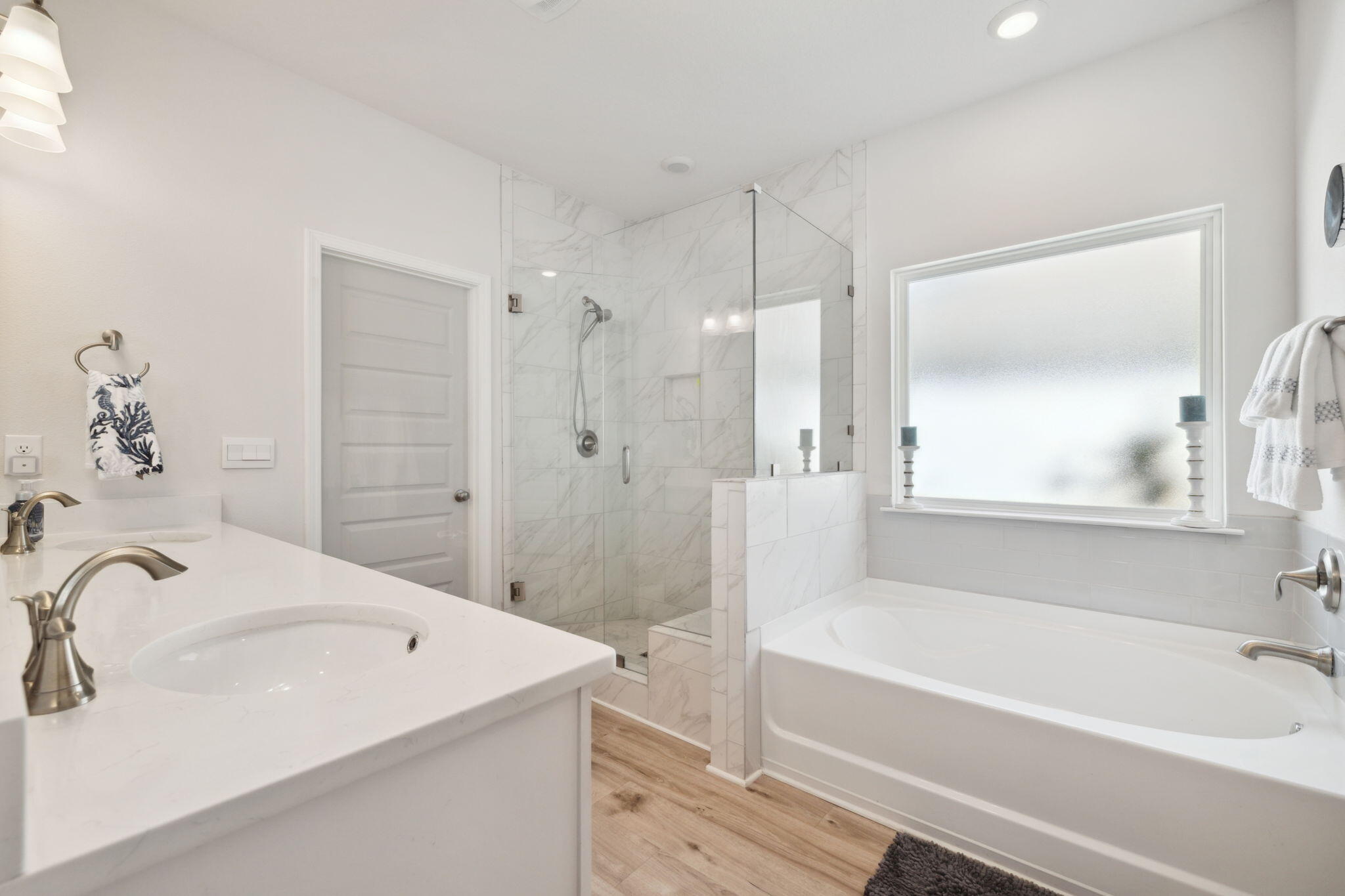 77 Palmview Lane Santa Rosa Beach, FL 32459 - Photo 24 of 37 a bathroom with a tub sink and a mirror