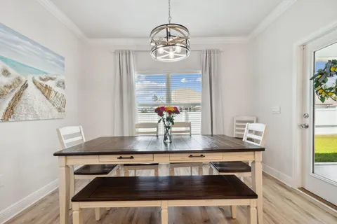 a view of a swimming pool with a lounge chair