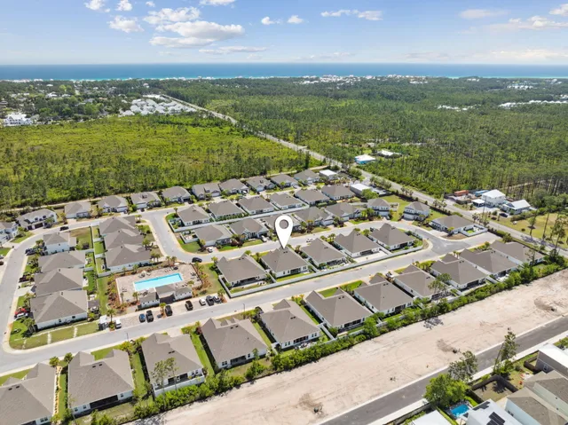 a view of a city with an ocean view