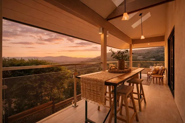 a kitchen with a sink and chairs