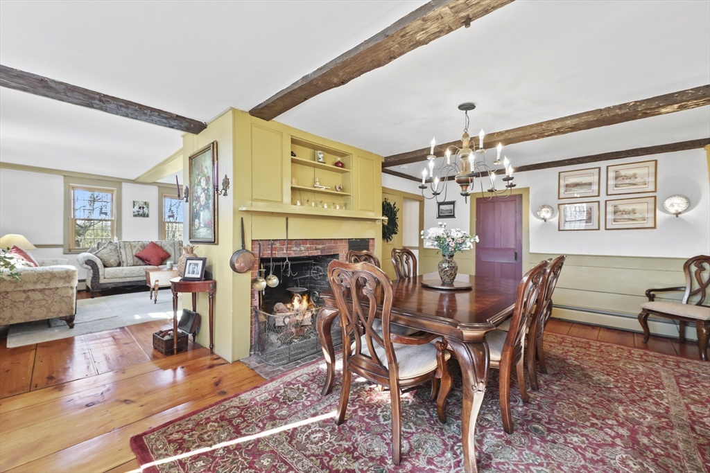 71 Prindle Hill Road Charlton, MA 01507 - Photo 13 of 40 a view of a dining room with furniture and wooden floor
