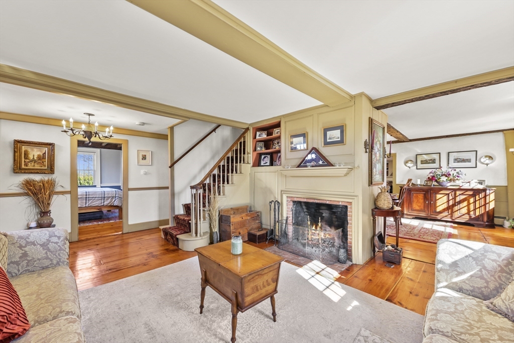 71 Prindle Hill Road Charlton, MA 01507 - Photo 15 of 40 a living room with furniture and a fireplace