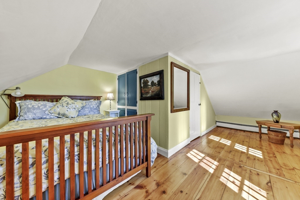 71 Prindle Hill Road Charlton, MA 01507 - Photo 31 of 40 a bedroom with a bed and a window
