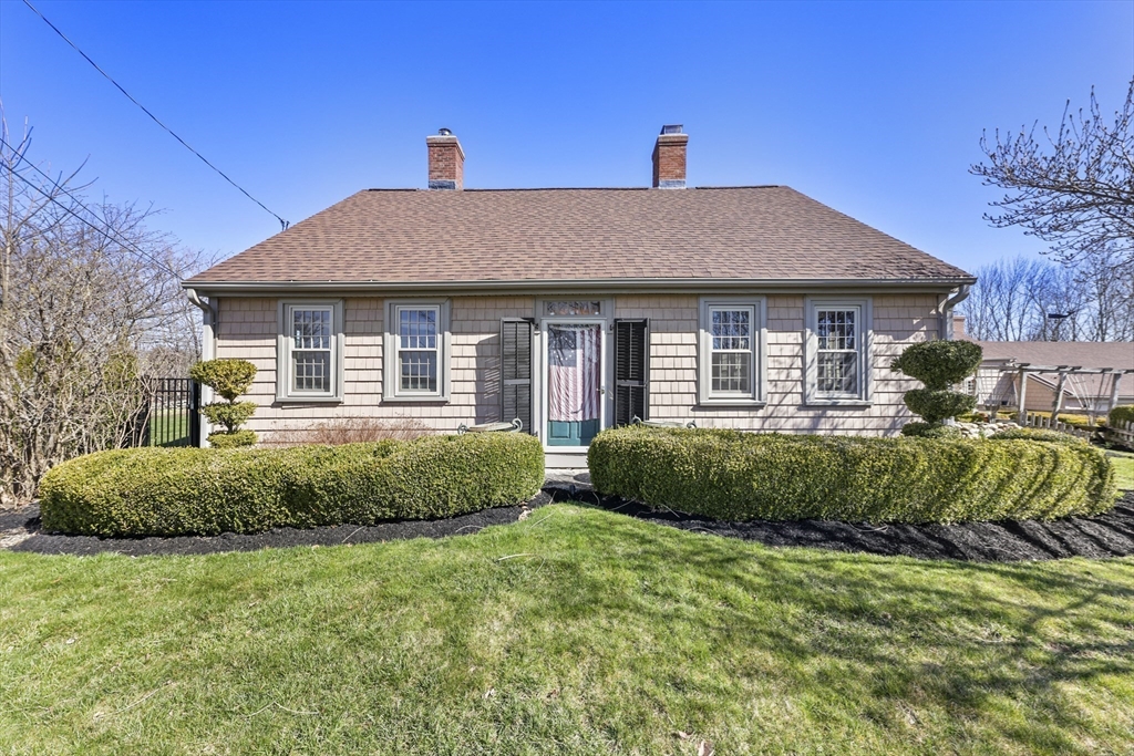 71 Prindle Hill Road Charlton, MA 01507 - Photo 33 of 40 a front view of a house with a garden