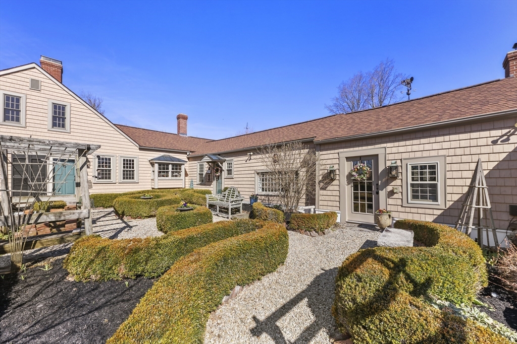 71 Prindle Hill Road Charlton, MA 01507 - Photo 35 of 40 a view of a house with swimming pool and furniture
