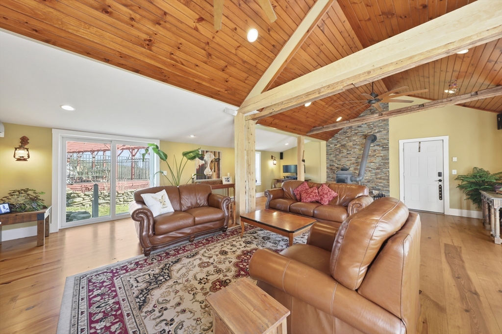71 Prindle Hill Road Charlton, MA 01507 - Photo 5 of 40 a living room with furniture and wooden floor