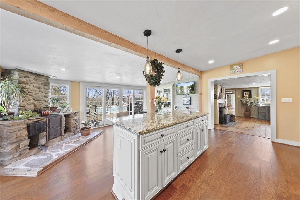 71 Prindle Hill Road Charlton, MA 01507 - Photo 9 of 40 a large white kitchen with a large window