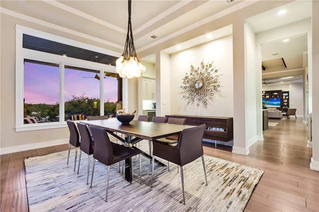 4217 Verano Drive Austin, TX 78735 - Photo 1 of 1 a view of a dining room with furniture window and wooden floor
