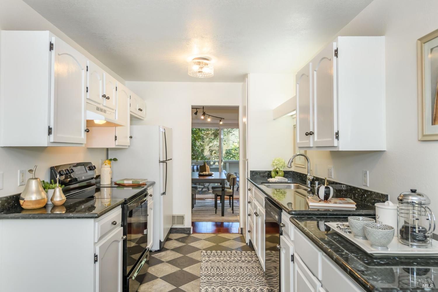 36 Schmidt Lane San Rafael, CA 94903 - Photo 3 of 31 a kitchen with stainless steel appliances granite countertop a sink stove and cabinets