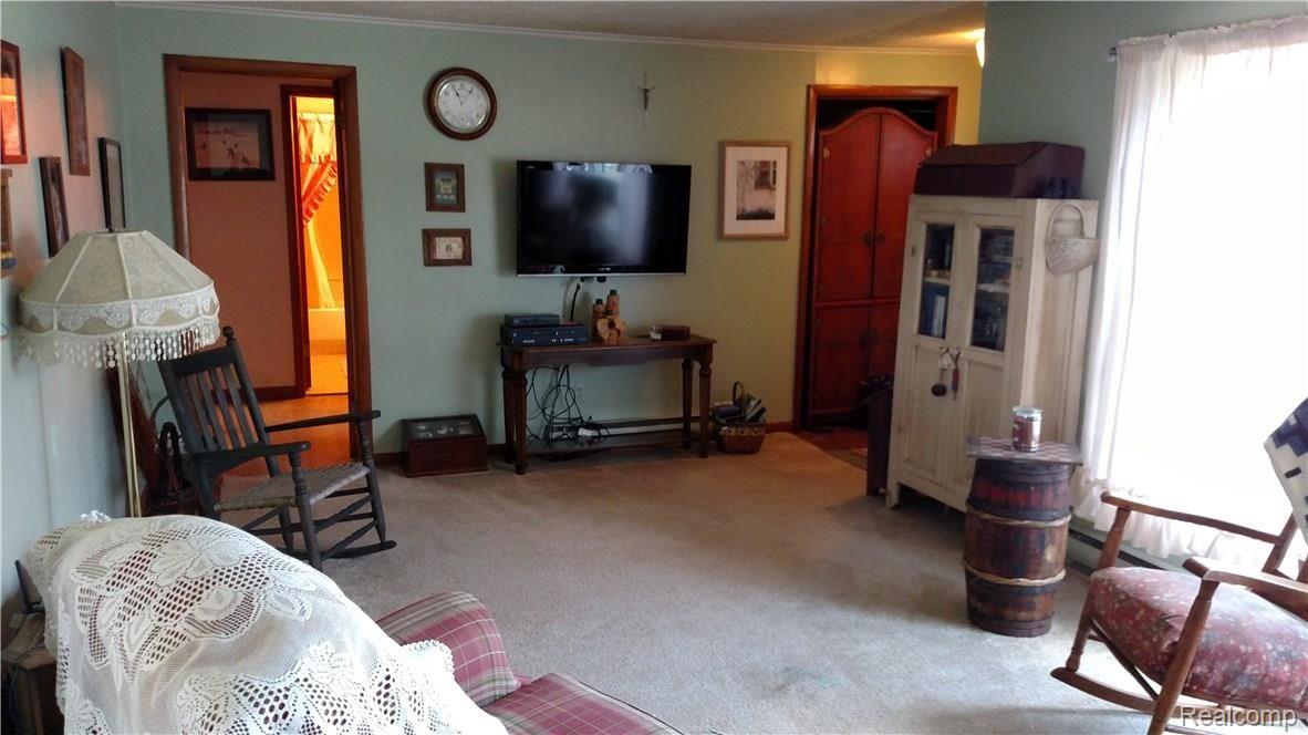 1568 Galbraith Line Road Yale, MI 48097 - Photo 7 of 23 This is another view of the living room.