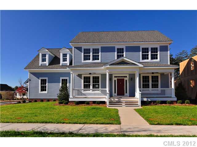 355 Olmstead Street, Unit 1351 Fort Mill, SC 29708 - Photo 1 of 1 a front view of a house with a yard